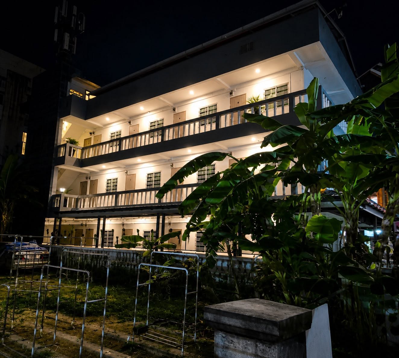 ZZ Boutique Apartment exterior illuminated at night